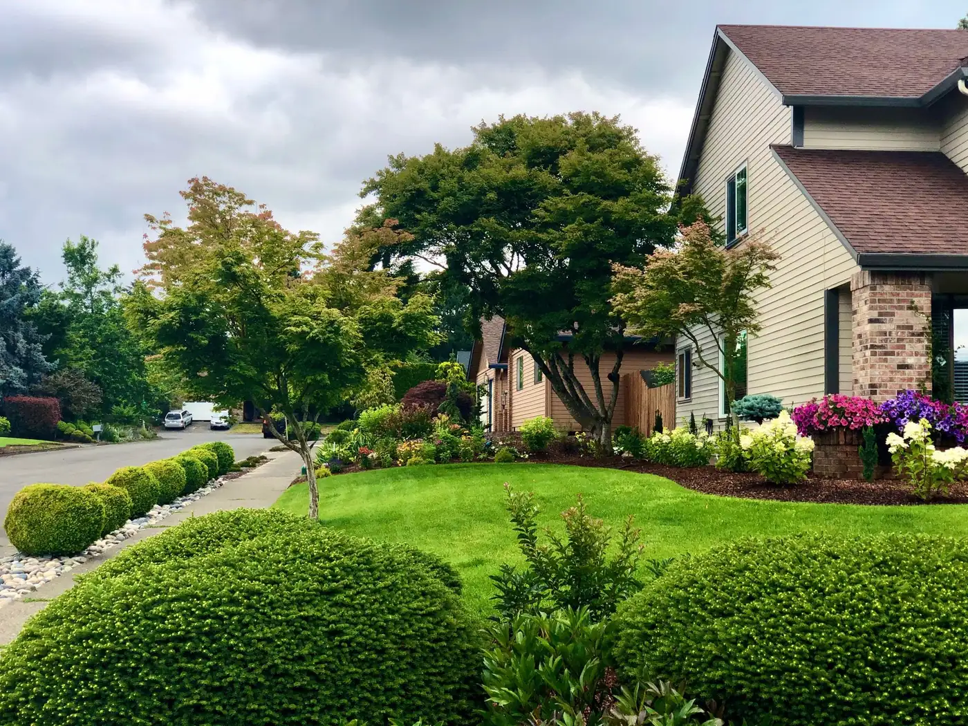 Landscaped garden and quiet street beside Fairway Home Care